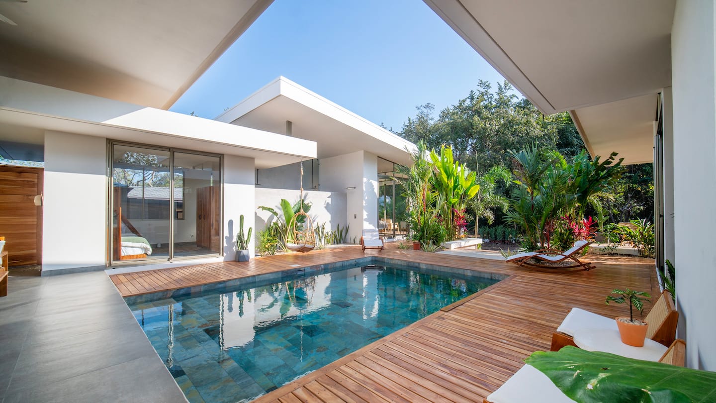 Casa Mavericks private pool with teak deck and tropical jungle backdrop